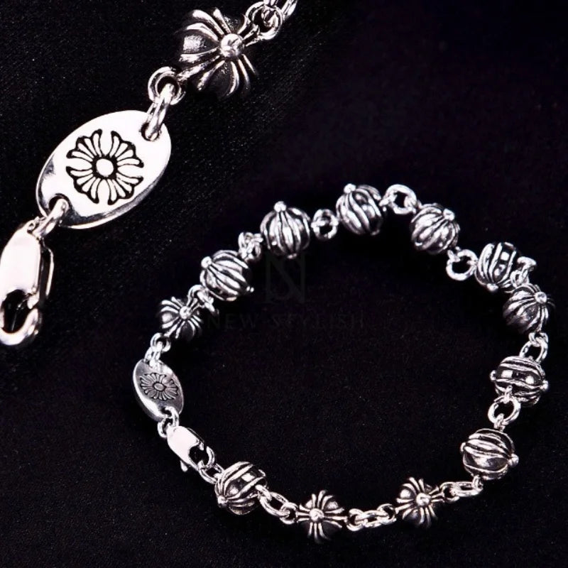 Gothic Silver-Tone Bracelet with Ornate Floral & Ribbed Bead Links